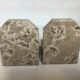 Pair of beige marble bookends.