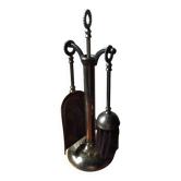 Small and discreet brass fireplace tool set.
