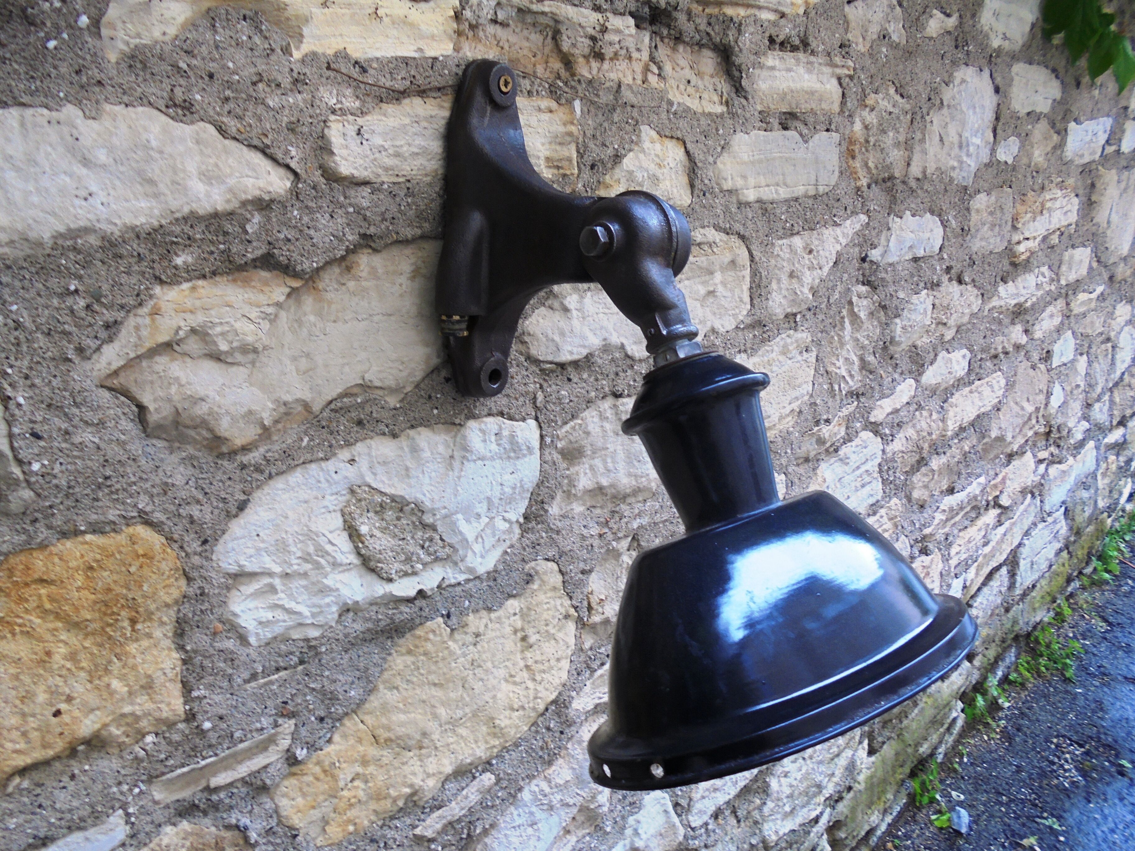 Antique cast iron and enamel wall lamp from the 1930s
