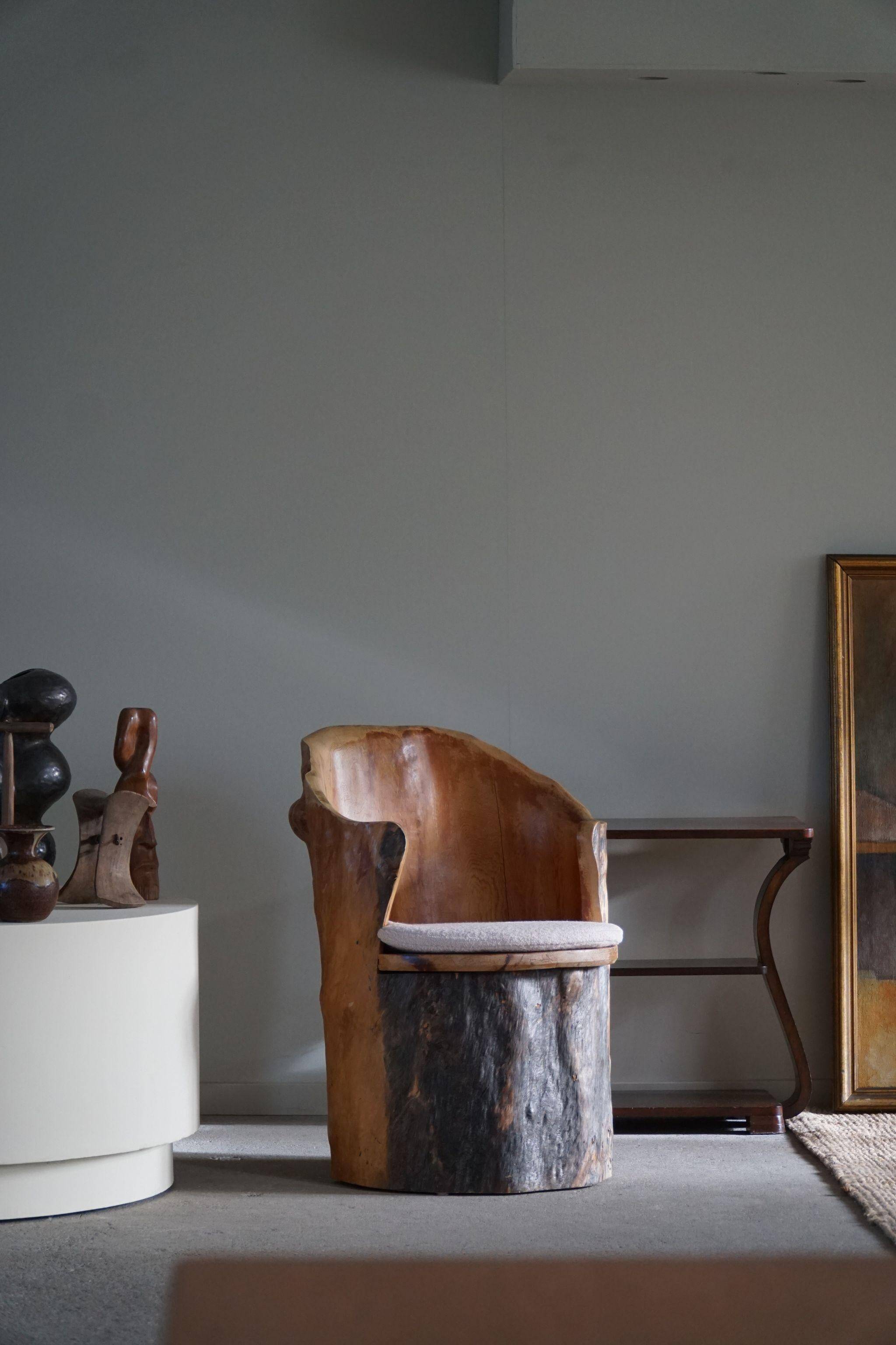 Sculptural brutalist armchair handcrafted in solid pine, Wabi Sabi style, Sweden, 1970s.