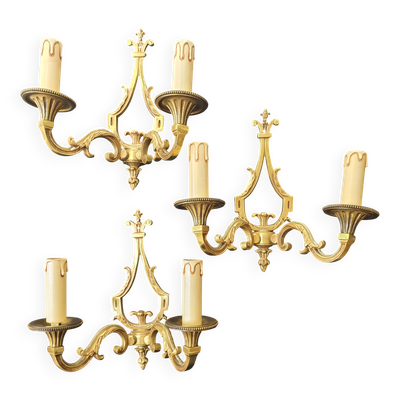 Trois appliques murales en bronze Louis XVI Lucien Gau Paris anciennes