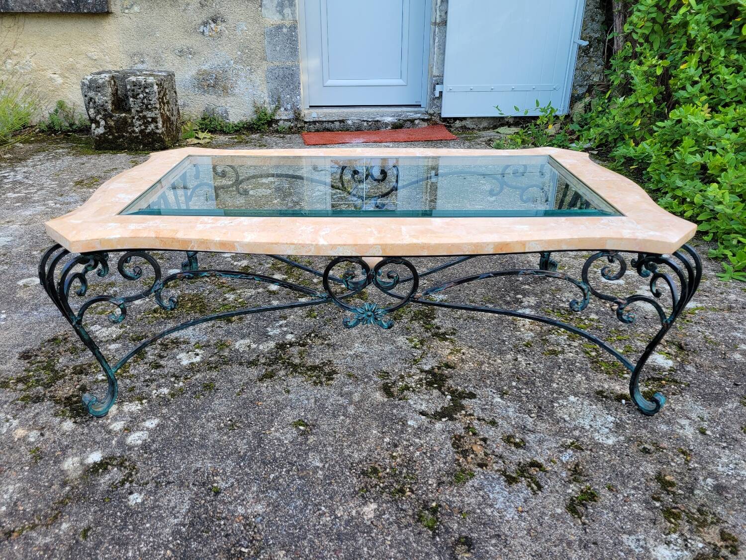 Pink marble and wrought iron coffee table