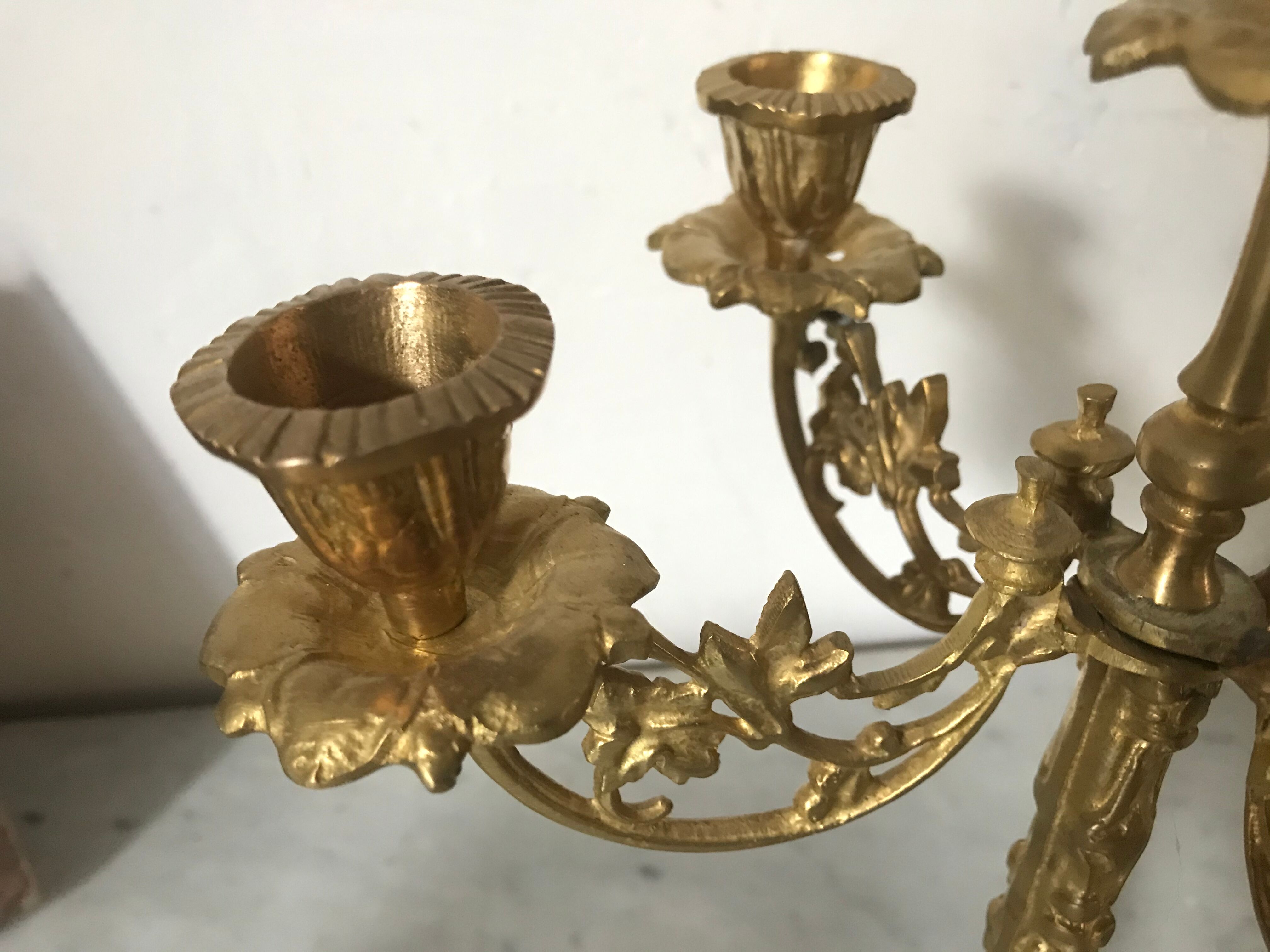 Pair of golden brass candlesticks