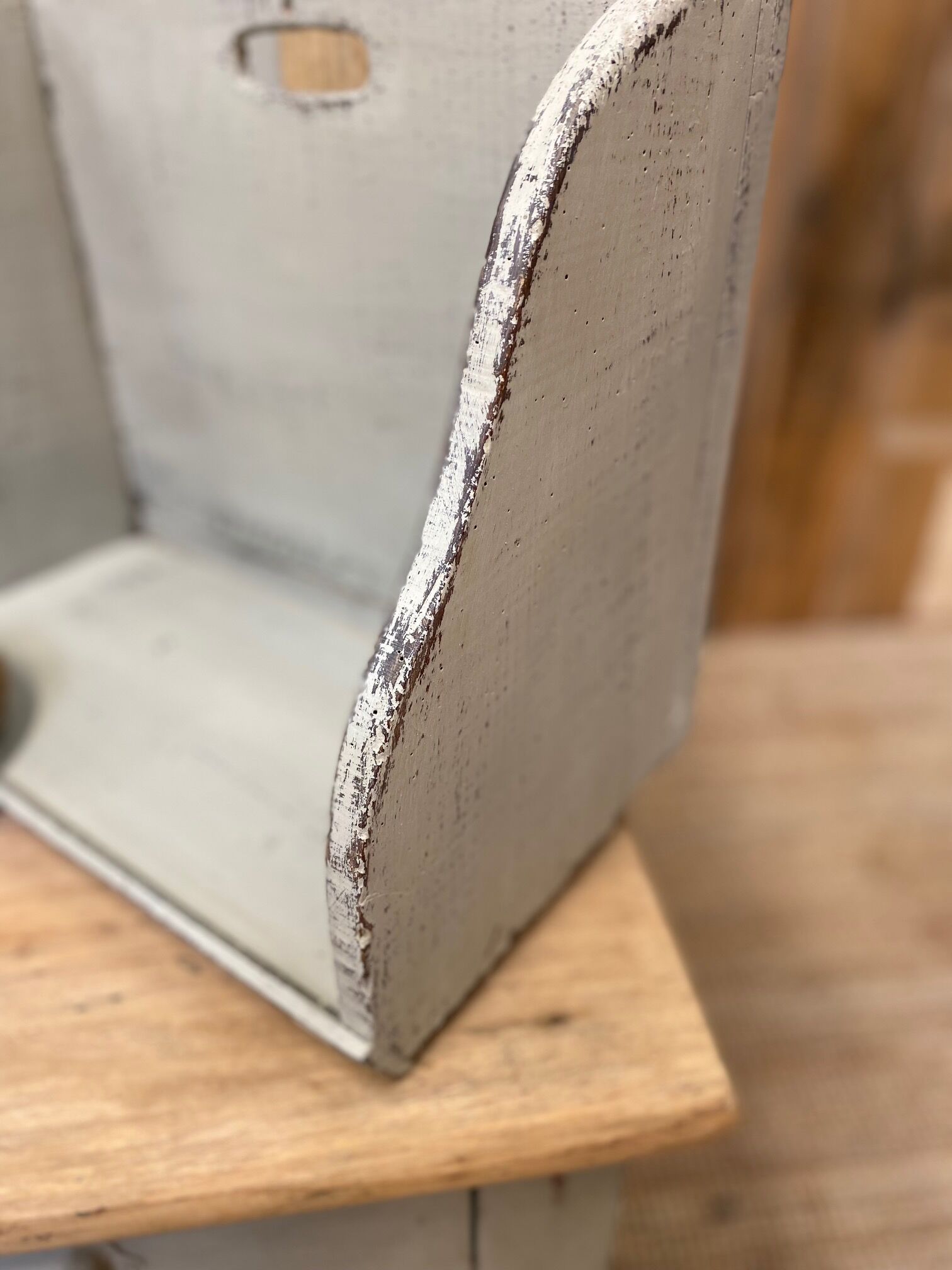 Old patinated washerwoman tray and its beater