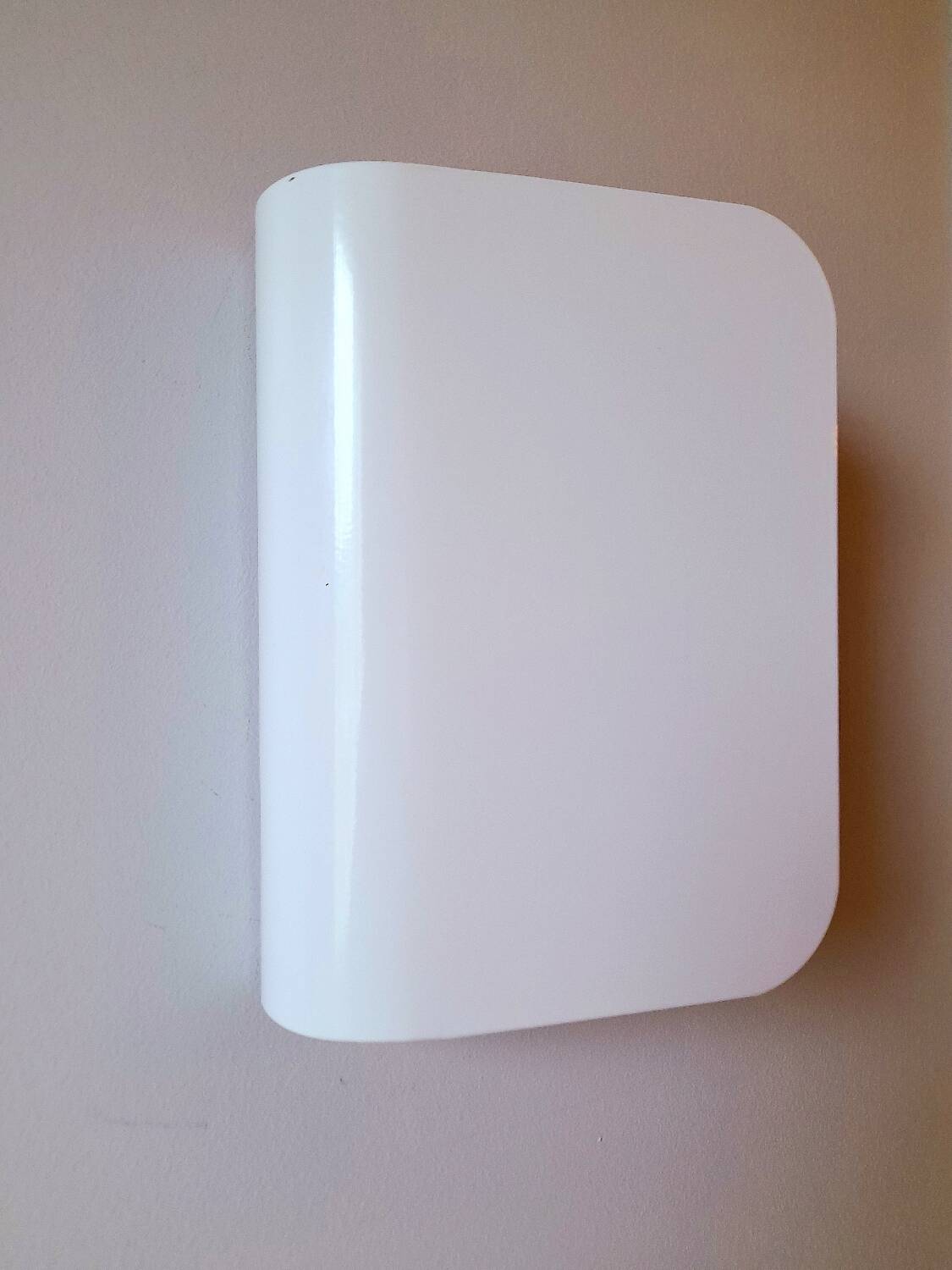 White lacquered metal wall sconces