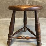 Tabouret tripode rond en bois foncé