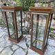 Pair of display cases in magnifying glass and black & gold lacquer, 20th century period