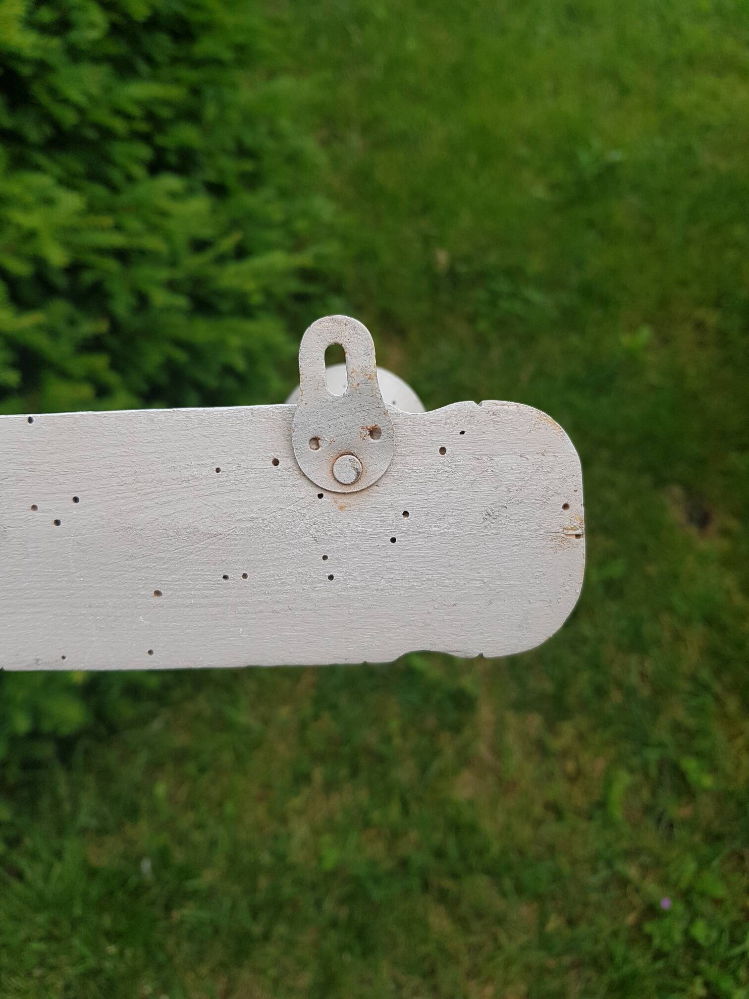 Old wall coat rack with linen patina