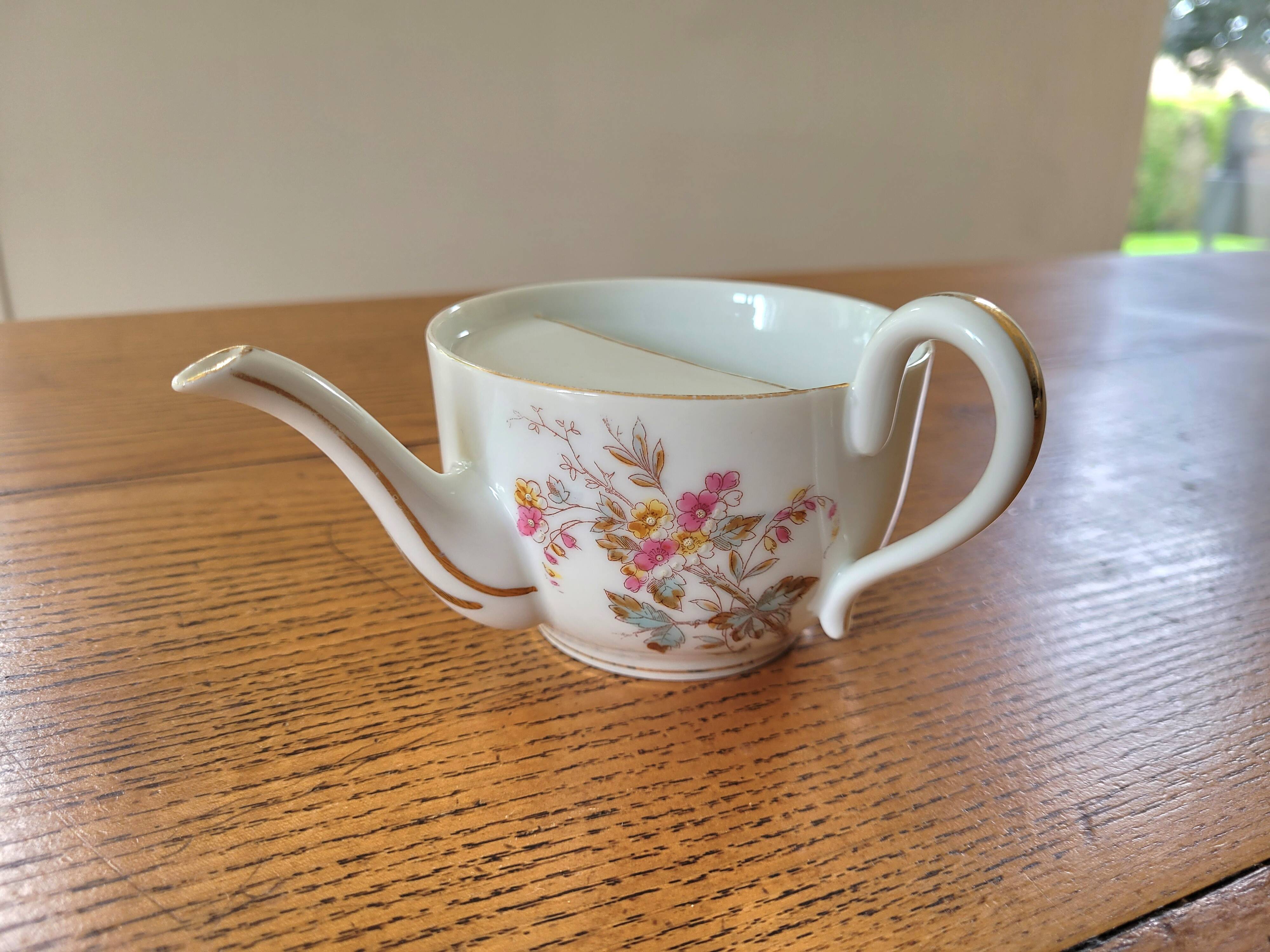 Antique porcelain duck mug for the sick