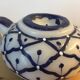 Vintage teapot shaped candle.