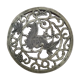 Underneath the brass dish