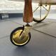 Italian marquetry and brass drinks trolley, mid-20th century