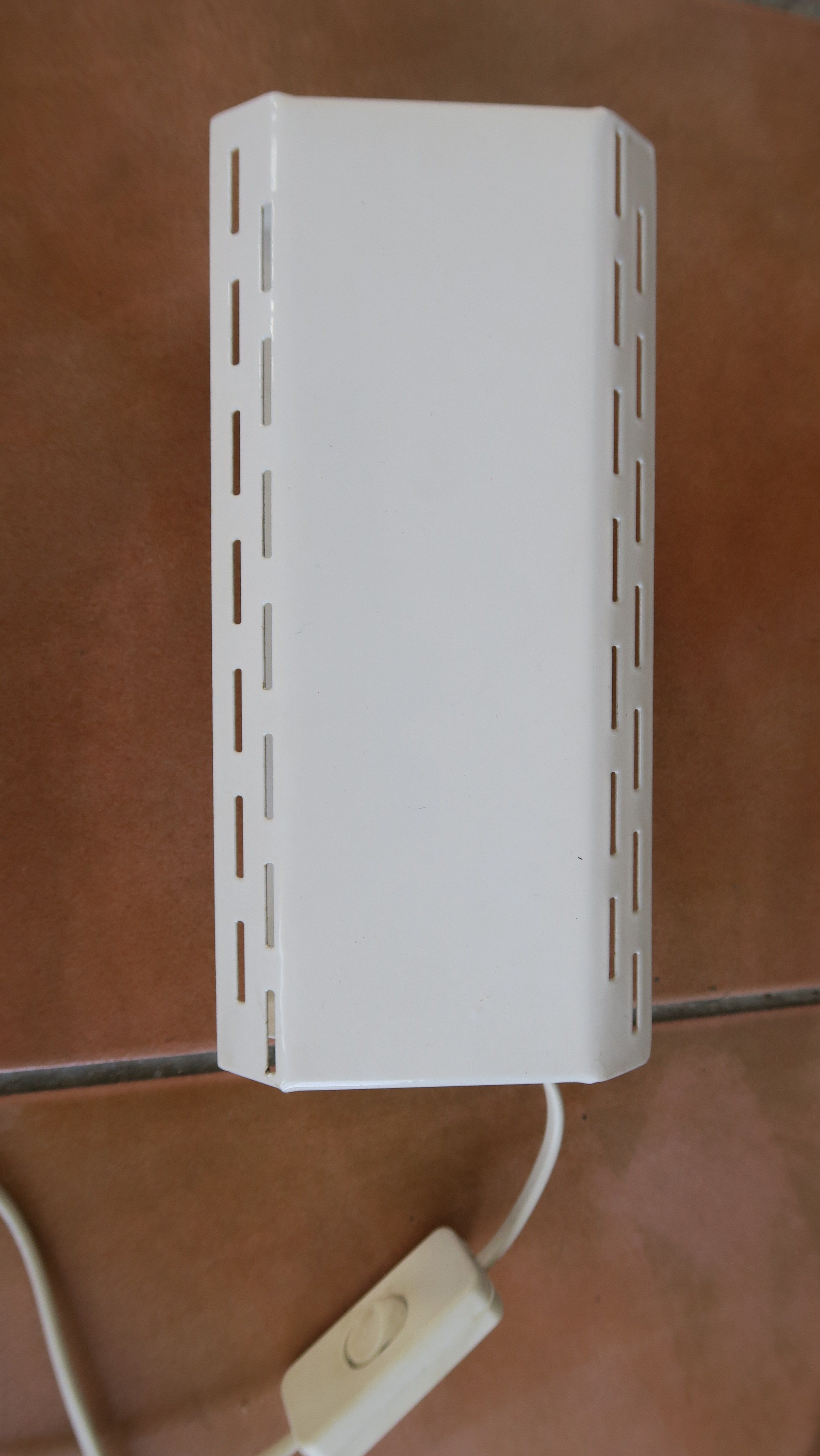 Wall lamp with red swivel shutter