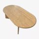 Oval coffee table in raw travertine