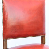 6 red leather chairs