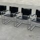 Ensemble de 4 chaises cantilever design noir et chrome fabriquées en Italie