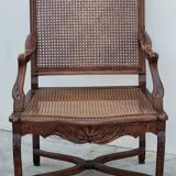Louis XV Regency cane armchair leather armrests decorated with shell