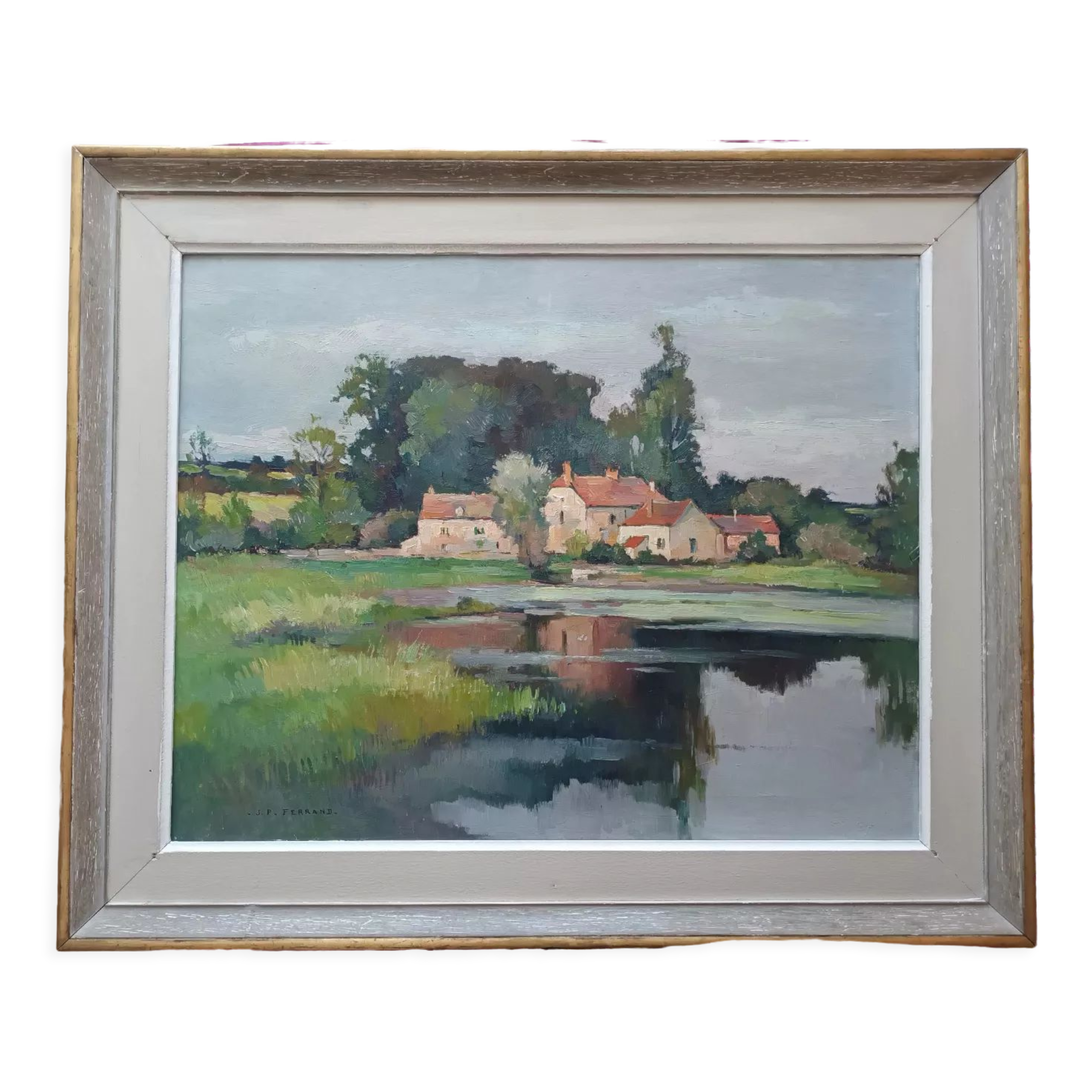 Oil on canvas by JP Ferrand: hamlet reflected in the pond