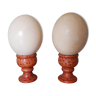 Pair of ostrich eggs mounted on ostrich leather base