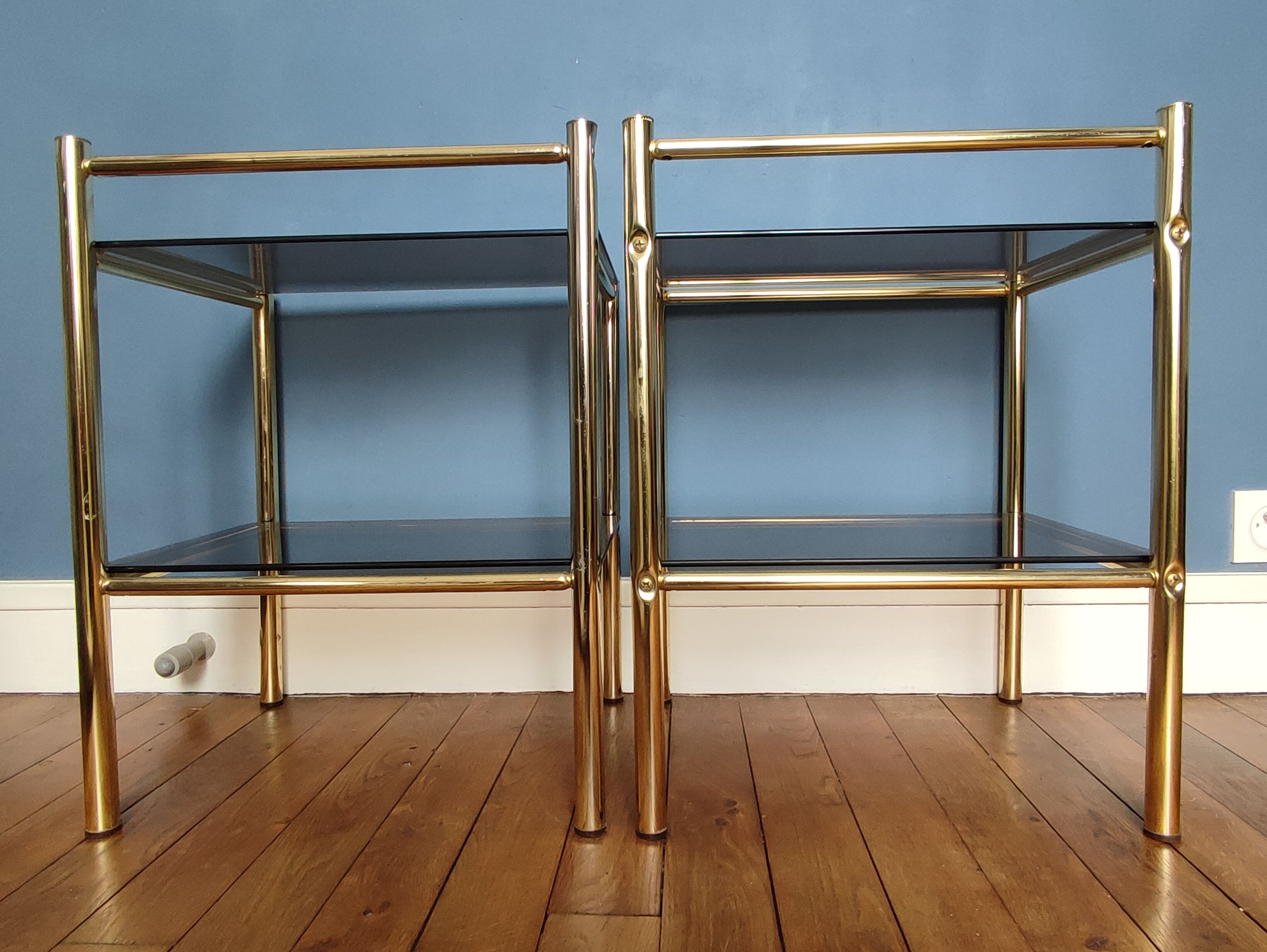 Pair of bedside tables, end of sofas in brass and vintage smoked glass