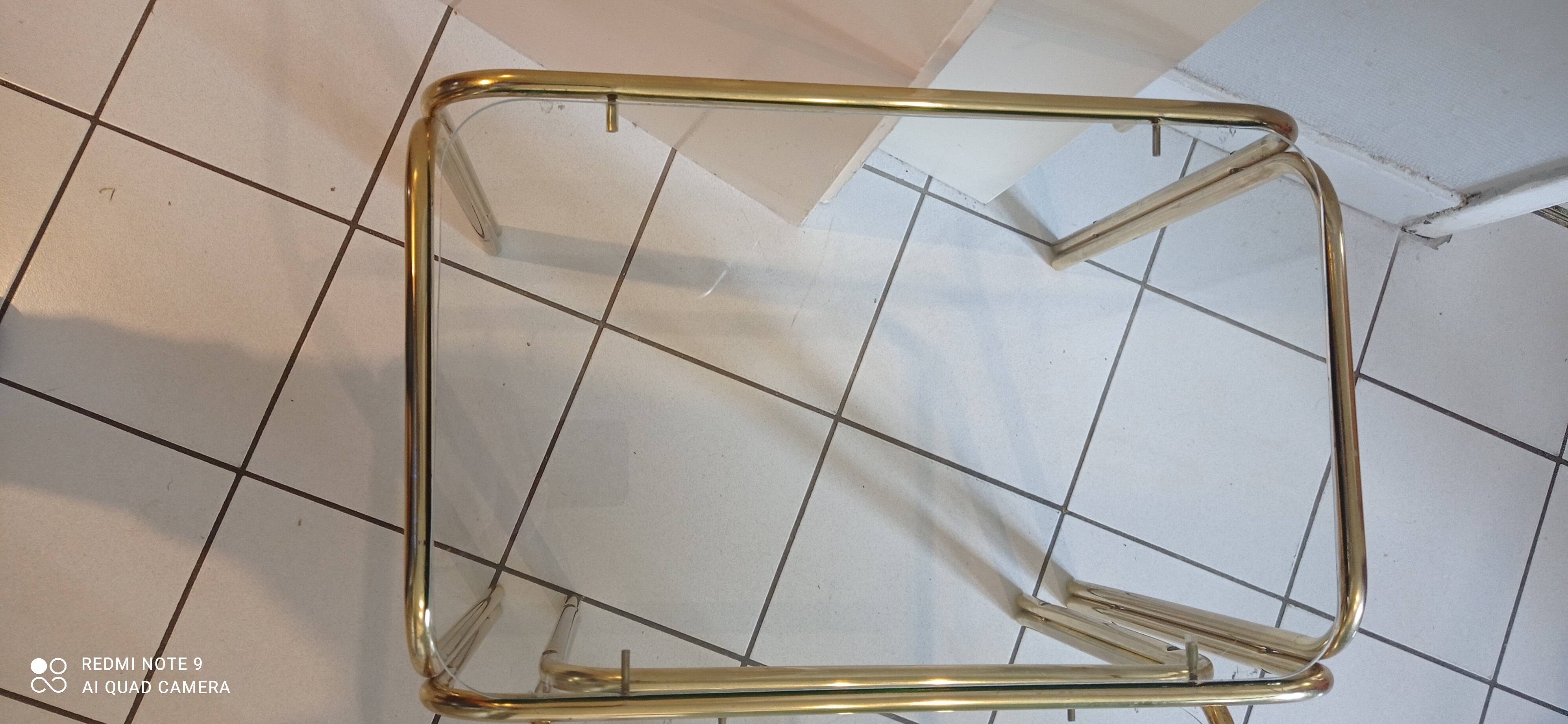 Trio of vintage golden nesting tables