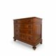 Antique walnut commode with bronze handles in the shape of a lion's mask,