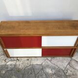 Storage cabinet with sliding doors circa 1950