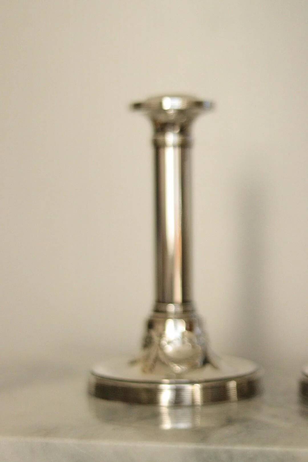 Pair of mid-century silver-plated metal candleholders