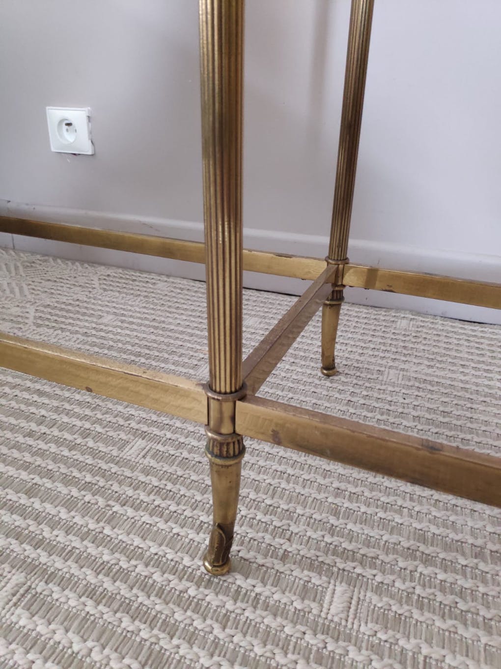 Glass and brass console table