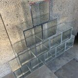 Modular bookcase, shelves composed of cubes facets of glass desselles