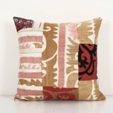 Vintage neutral suzani patchwork pillow fashioned from a mid-20th century samarkand suzani