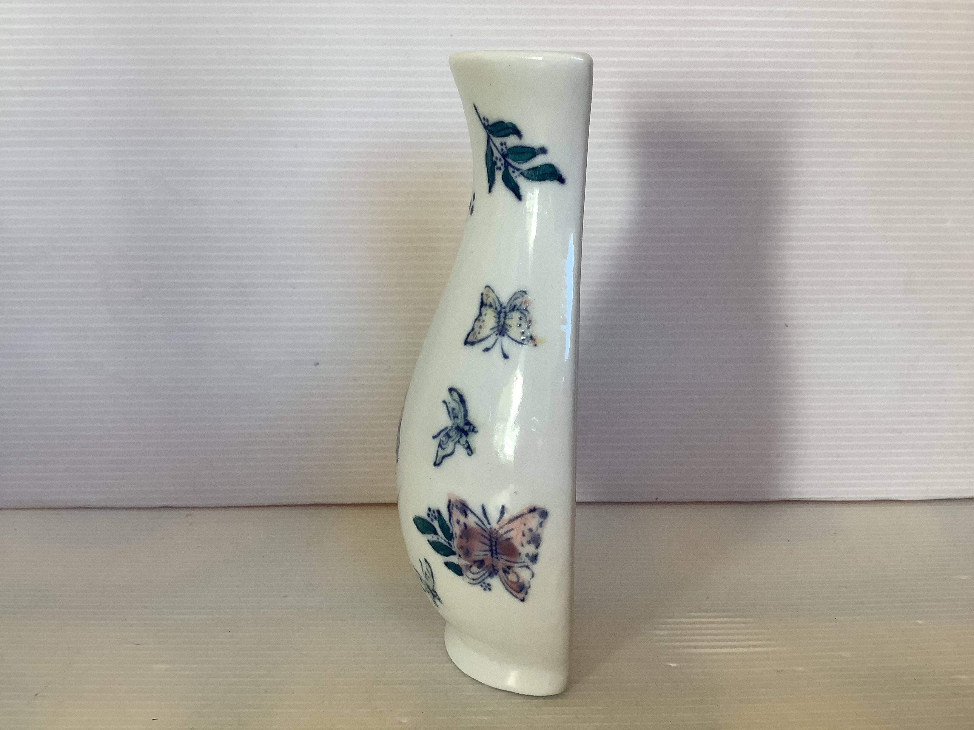 Flower vase with butterflies