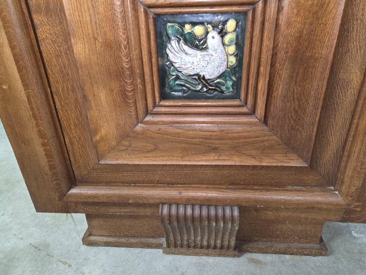 According to Maxime Old: decorative furniture in oak and ceramic from the Art Deco period (B)