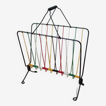 Vintage magazine rack in colorful wire
