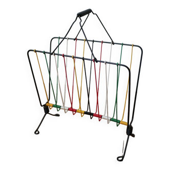 Vintage magazine rack in colorful wire