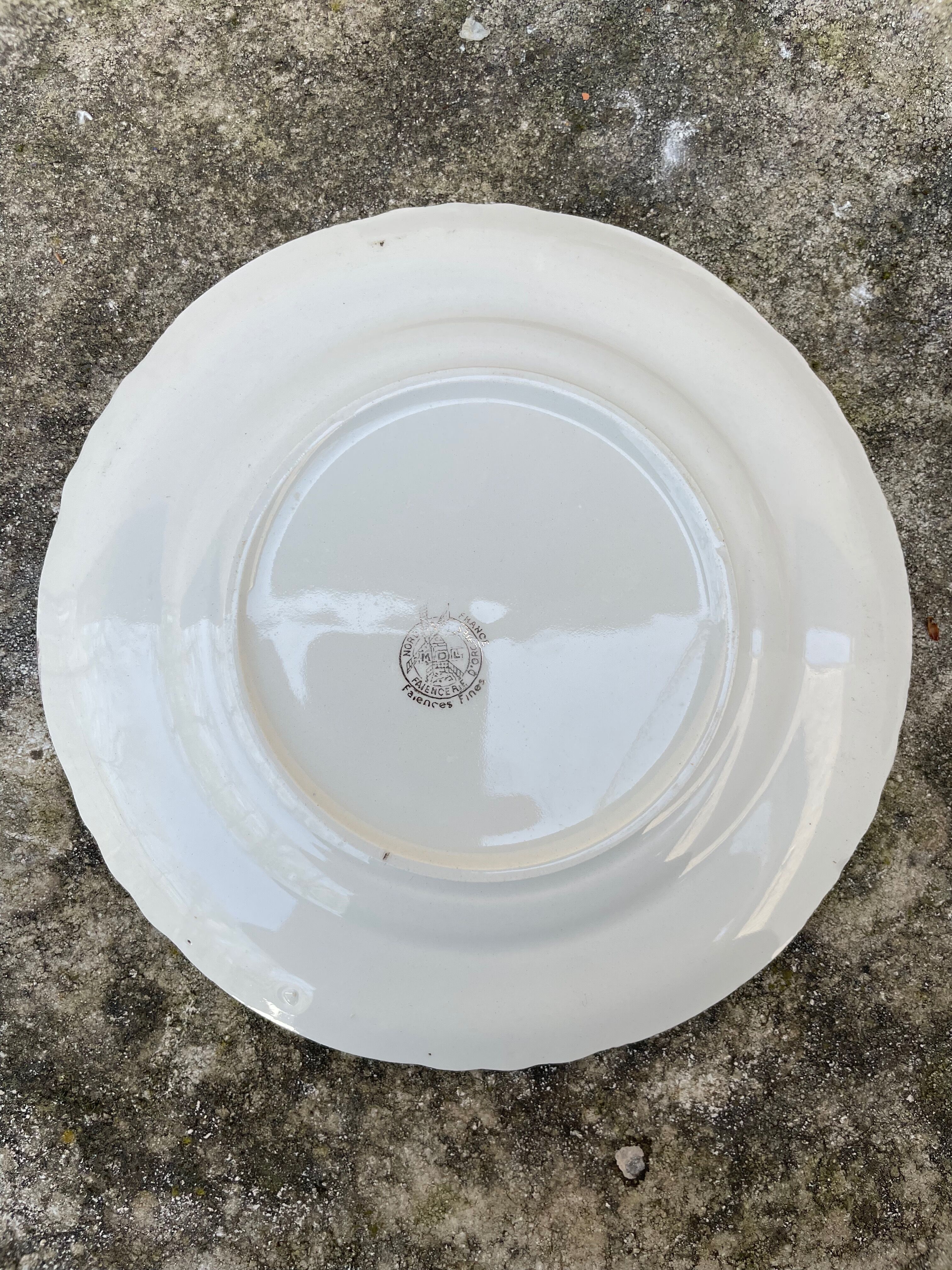 Set of 4 plates with floral motif, golden border early twentieth century