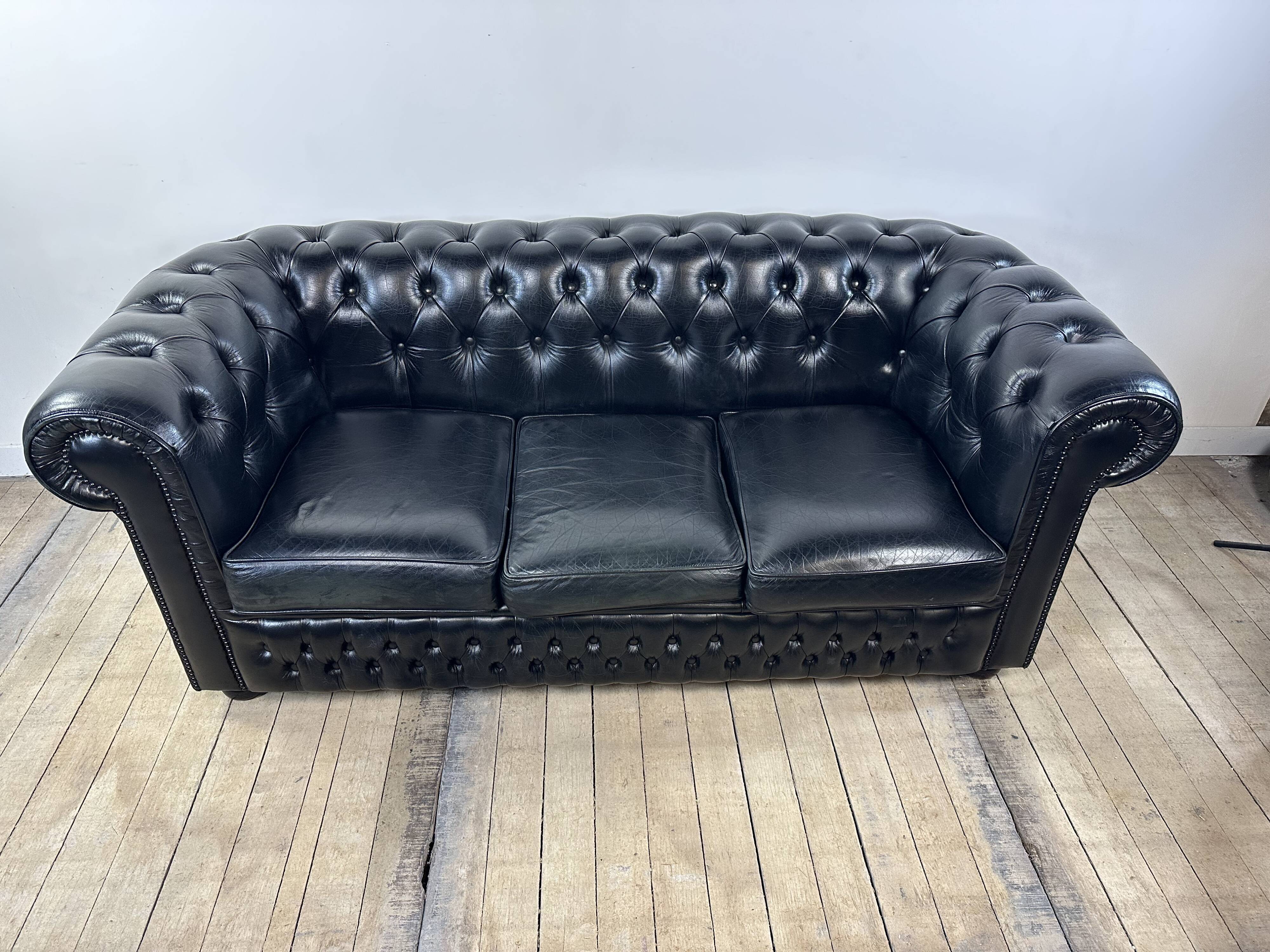 Vintage 1980 black leather Chesterfield sofa