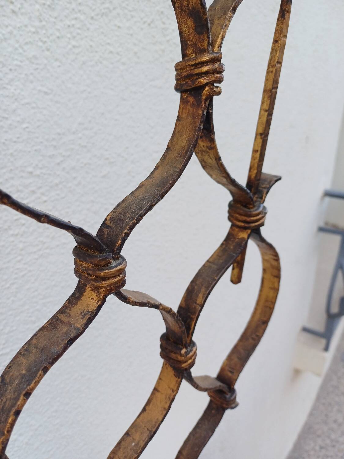 Large hammered wrought iron table candlesticks, gilded, 1950s, 60s