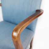 Armchair in mahogany and upholstered with light blue fabric by Fritz Hansen