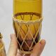 Vintage orangeade service in amber blown glass and wicker