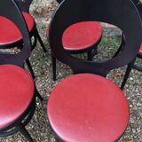 6 vintage Baumann seagull model chairs, black lacquered with red Skai seats.
