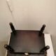 Antique footrest stool in wood and fabric