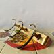 Vintage wall-mounted coat rack in golden aluminum - triple coat hook