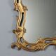 Miroir ancien en bois sculpté et doré, Italie, début XXe siècle