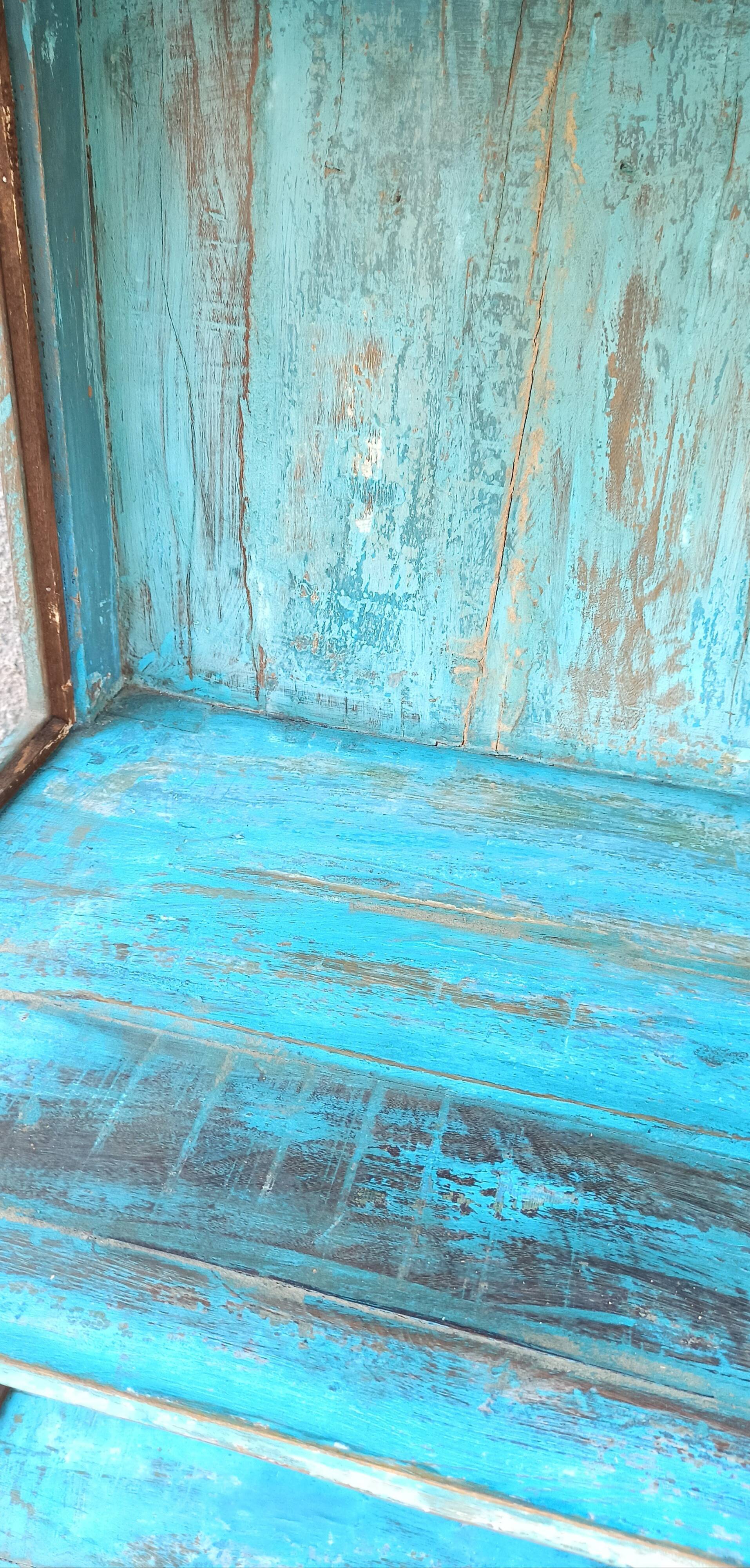Blue wooden showcase