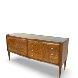 Veneered burl walnut chest of drawers with light warm brown glass top