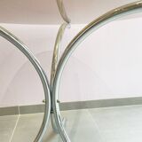 Chromed metal and smoked glass table
