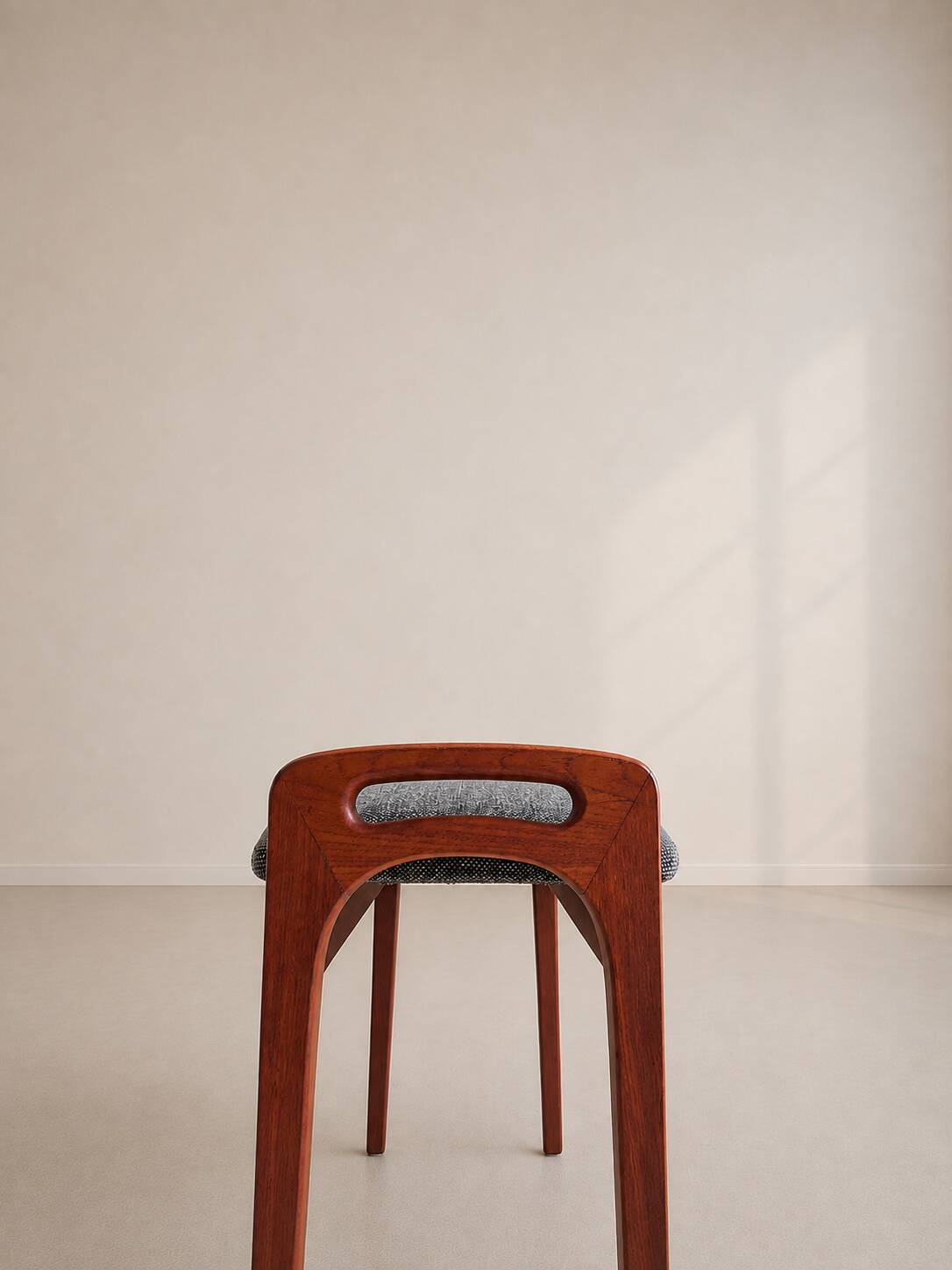 Teak piano bench attributed to Johannes Andersen for Uldum Møbelfabrik.