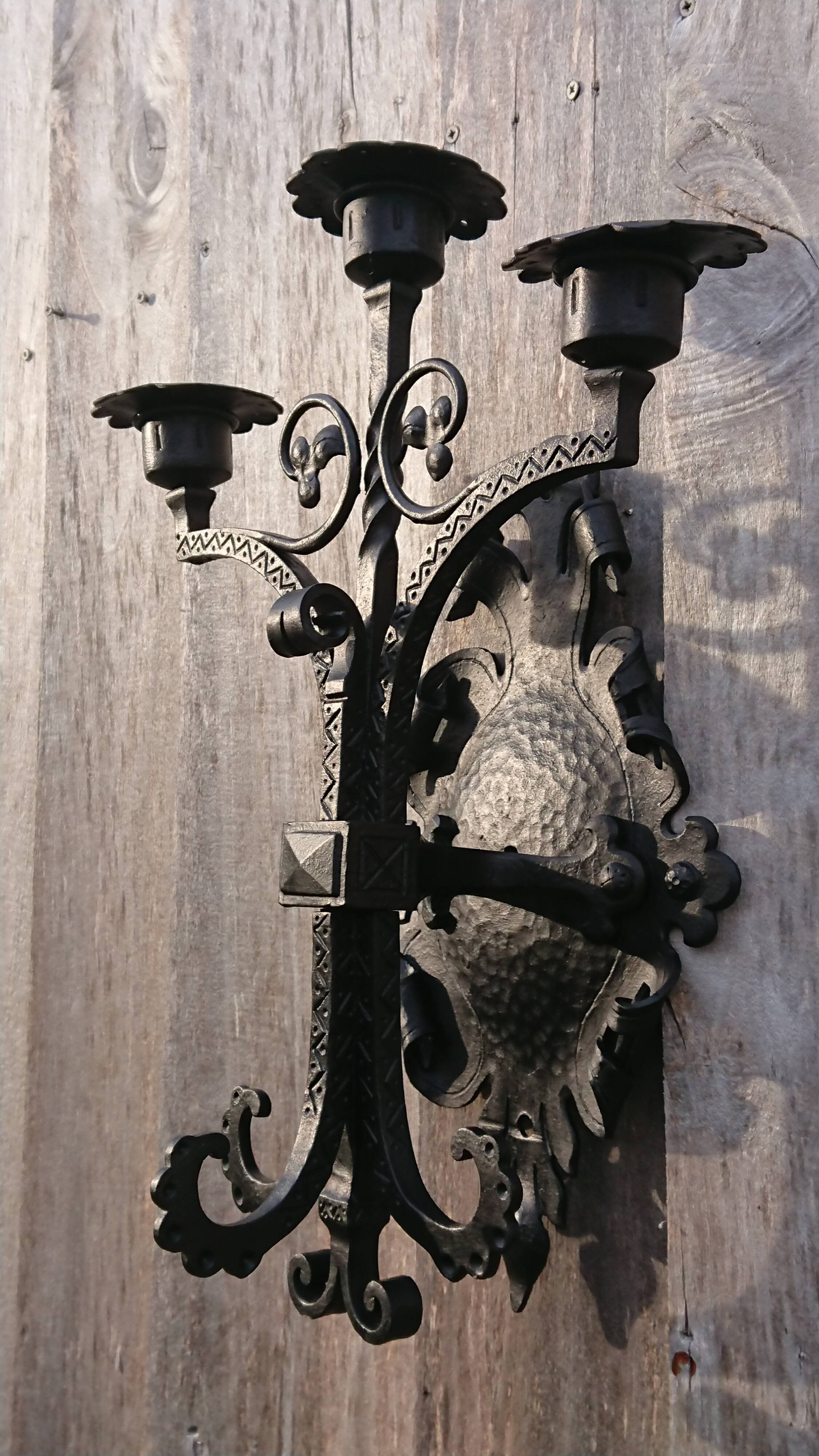 Pair of black wrought iron sconces - neo-Gothic style - from the 1950s