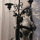 Pair of black wrought iron sconces - neo-Gothic style - from the 1950s